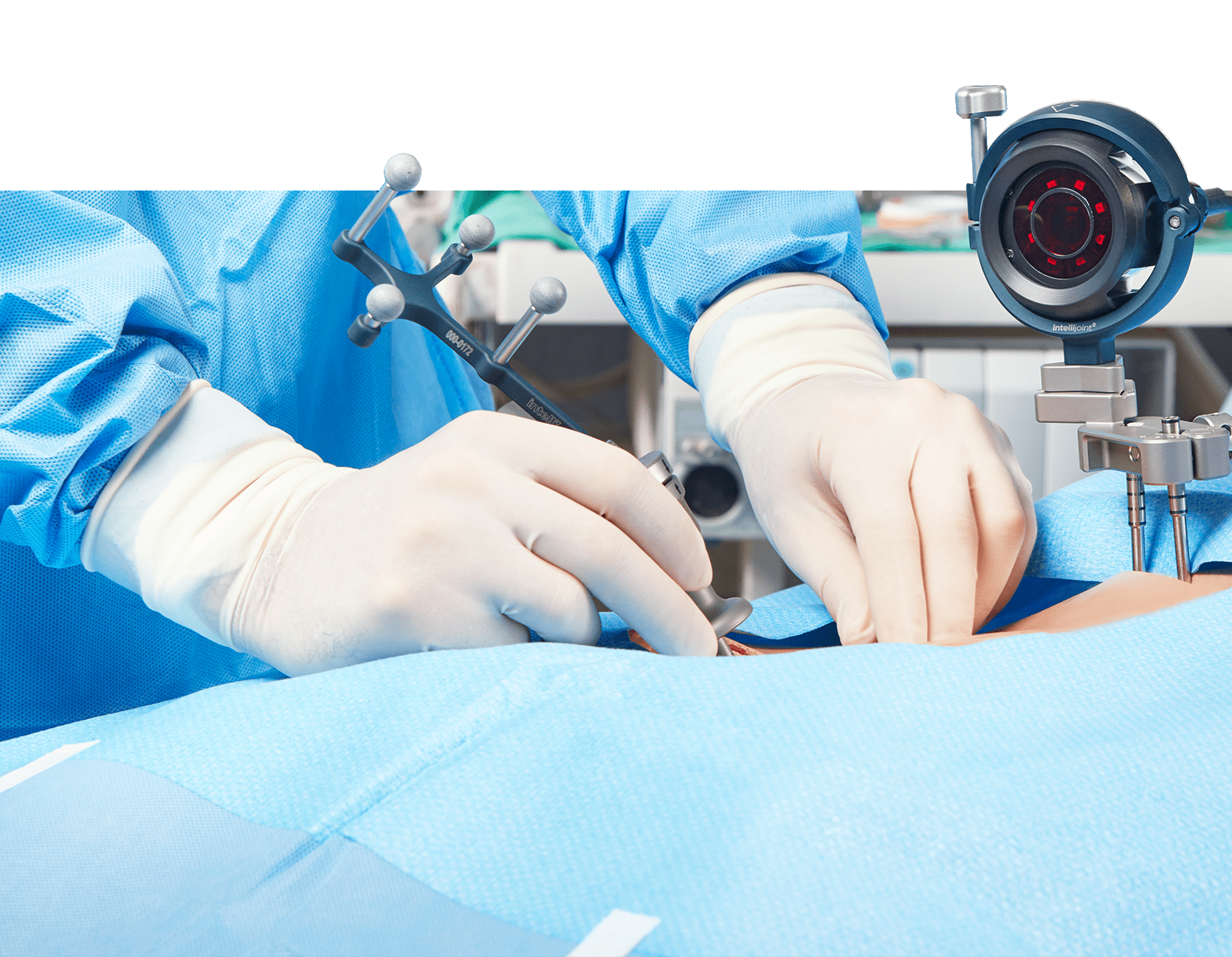 Intellijoing HIP Image - Seamless Integration Lateral view of surgeon performing THA using Intellijoing HIP navigation camera and tools
