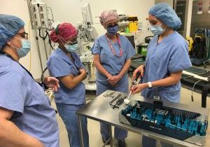 Surgeons gathered around Intellijoint HIP product